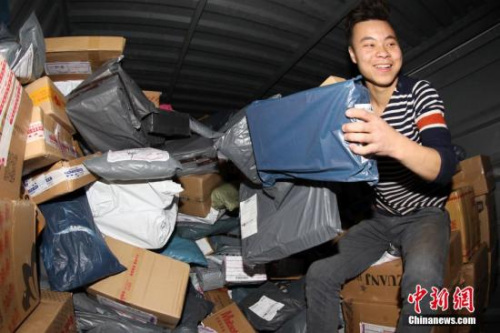 双11电商大战开到 快递实名制首迎物流高峰大考